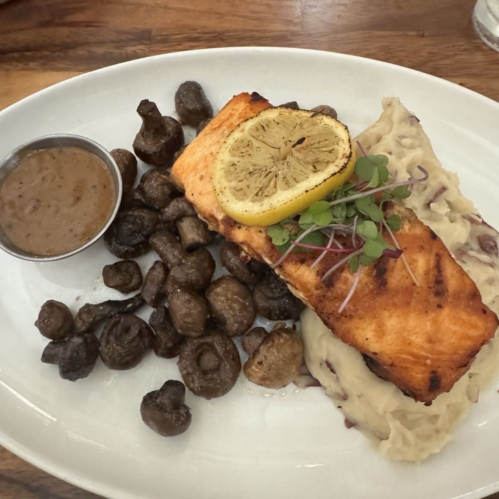 Center Square Grill - Grilled salmon with mashed potatoes and mushrooms and peppercorn cream sauce - New American Near Me - East Longmeadow, Massachusetts