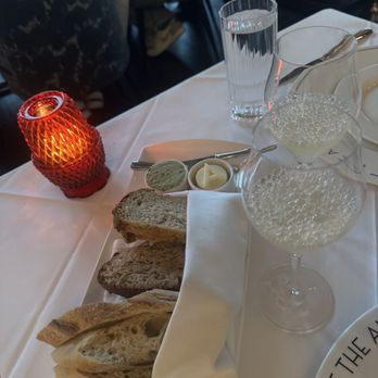 The Alston - Complementary bread and champagne - Steakhouses Near Me - Chicago, Illinois