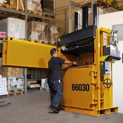 Wibbelman & Company - 60 inch Baler, 3 Phase This baler fits standing through a 8 foot Dock Door, Lower profile can operate under 11 foot ceiling...