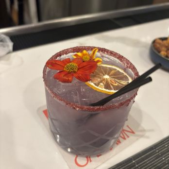 The Bugler - Gin and tonic special--purple gin with hibiscus sugar rim - Desserts Near Me - Hot Springs, Arkansas