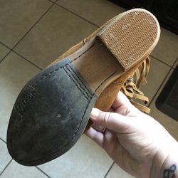 Famous Shoe Repair - Fresh new heel on that there boot, though I'm curious why it's not black?