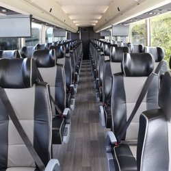 Perimeter Transportation Whistler Shuttle - Perimeter Ultra Luxury Motorcoach interior featuring 52 comfortable leather seats with extra legroom and seat-belts, WiFi, DVD & washroom.