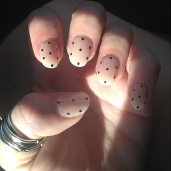 Top Nails - Nude acrylic nails with black polka dots - nail art done by Quincy - Nail Salons Near Me - Calgary, Alberta