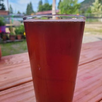 River Time Brewing - a glass of beer on a wooden table - Breweries Near Me - Darrington, Washington