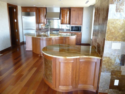Natural Wood Kitchen Cabinets - Although painted white is the trend, natural wood cabinetry is still beautiful!