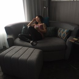 Basic king room with modern loveseat. Basic king room with modern loveseat.