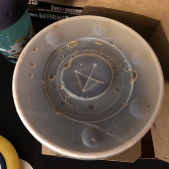 Wingstop - a plastic cup and a banana on a table - Chicken Wings Near Me - Hayward, California
