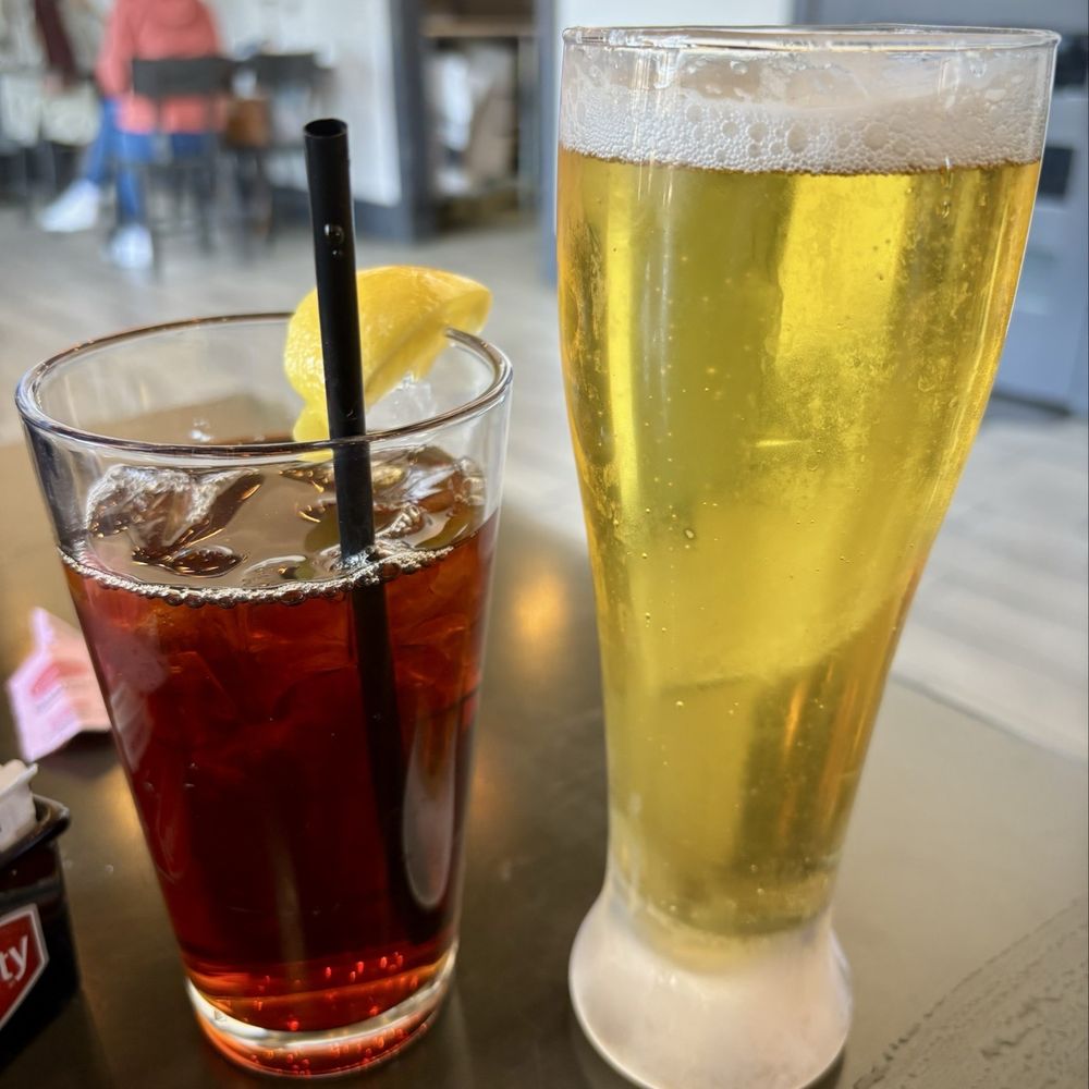 The District - Iced tea and a Catahoula Common lager. - New American Near Me - Ponchatoula, Louisiana The District - Iced tea and a Catahoula Common lager. - New American Near Me - Ponchatoula, Louisiana