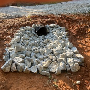 Patriot Septic LLC - Hand placed stone around a driveway culvert to prevent erosion - Excavation Services Near Me - Marietta, South Carolina Patriot Septic LLC - Hand placed stone around a driveway culvert to prevent erosion - Excavation Services Near Me - Marietta, South Carolina