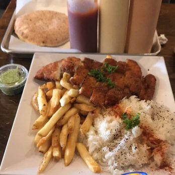 Duzan - Chicken schnitzel with rice and fries - Middle Eastern Near Me - Queens, New York Duzan - Chicken schnitzel with rice and fries - Middle Eastern Near Me - Queens, New York