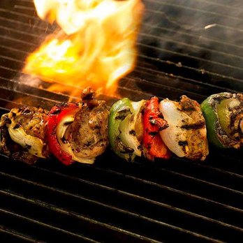 The Butter Chicken Co - a skewer of vegetables on a grill - International Near Me - Fairview, Alberta The Butter Chicken Co - a skewer of vegetables on a grill - International Near Me - Fairview, Alberta