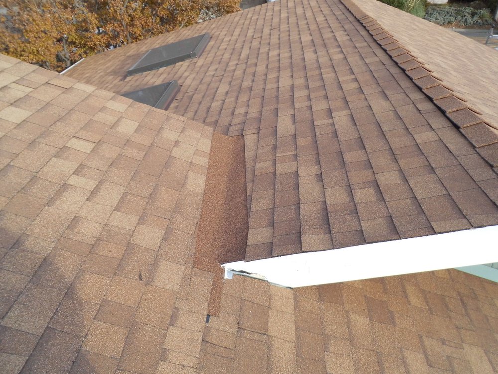 Slide of 1 N Done Roofing Services