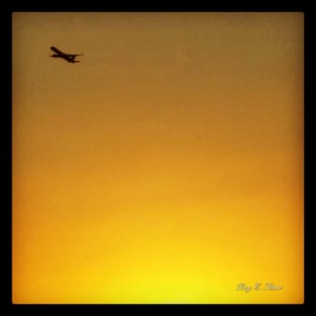 94th Aero Squadron - A sunset view from the 94th Aero Squadron as a plane is taking flight. - New American Near Me - Miami, Florida 94th Aero Squadron - A sunset view from the 94th Aero Squadron as a plane is taking flight. - New American Near Me - Miami, Florida