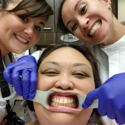 Smiles On Madison - The hygentist and dental assistant took a selfie with me. The staff there are great! So through and informative.
