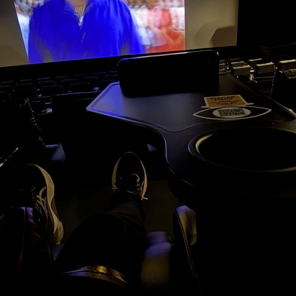 Alamo Drafthouse Cinema Mountain View - Each chair has a small table for food and a cup holder for drink - Cinema Near Me - Mountain View, California Alamo Drafthouse Cinema Mountain View - Each chair has a small table for food and a cup holder for drink - Cinema Near Me - Mountain View, California