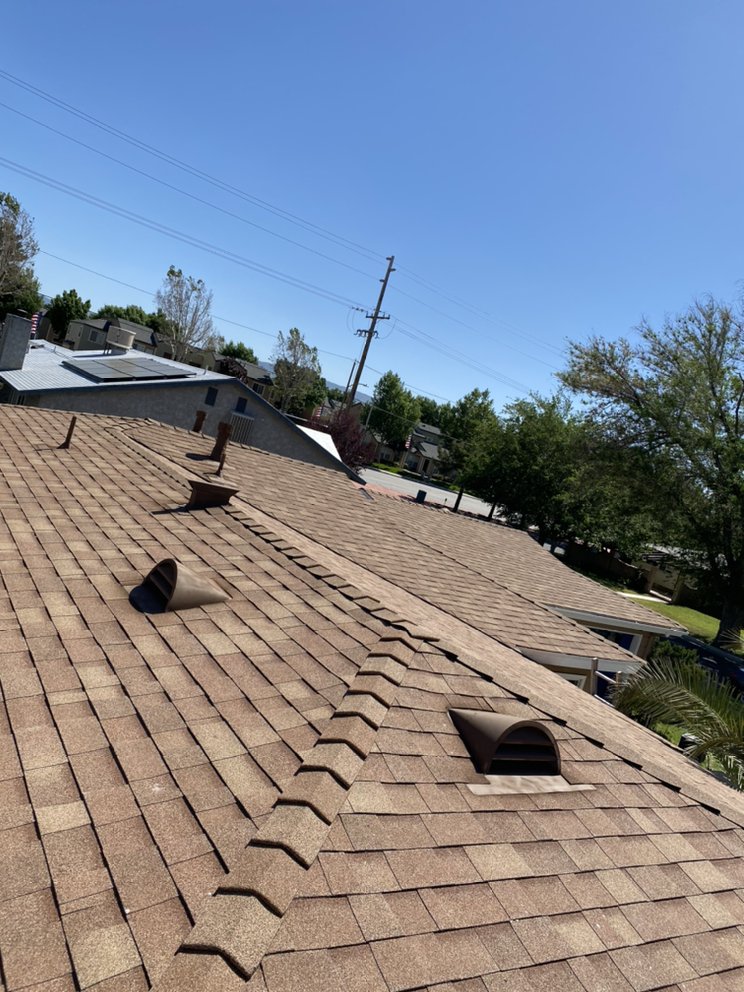 Slide of Benny’s Roofing Services