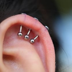 The Piercing Bar - Triple vertical helix piercing