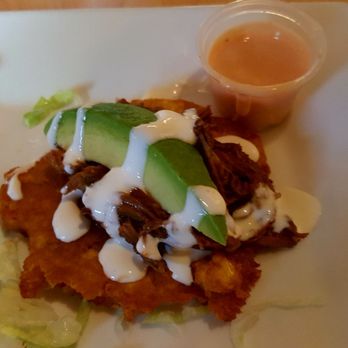 Mambo Cafe - My favorite Tostones con Ropa Vieja.. Delicious.. Fried green plantain top with seasoned pulled pork top with avocado and sour cream! - Colombian Near Me - Pleasantville, New Jersey