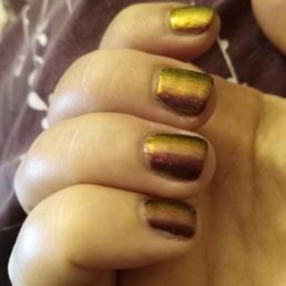 The side view that shows the whole nails wasn't even painted..