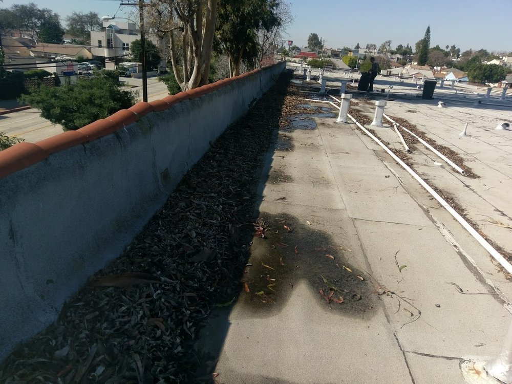 Slide of De Lorenzo's Guaranteed Roofing