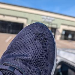 Lucky Shoes Repair & Tailor - My repaired shoe and store in the back