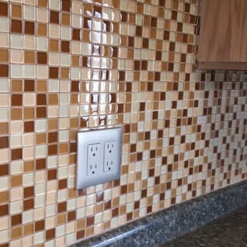 McCoy Construction - a tile backsplash with a light switch - General Contractors Near Me - Reedsburg, Wisconsin McCoy Construction - a tile backsplash with a light switch - General Contractors Near Me - Reedsburg, Wisconsin
