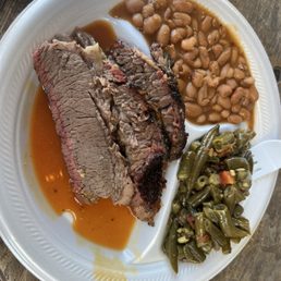 Brisket, green beans, and baked beans Brisket, green beans, and baked beans