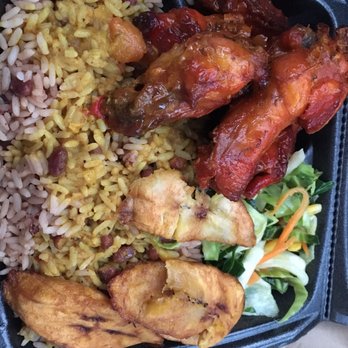 Golden Krust Caribbean Restaurant - Bbq wings entree with the regular sides of rice and peas, plantains, vegetables (usually a cabbage mix) - Caribbean Near Me - Union, New Jersey