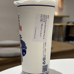 Teazzi Tea Shop - Dark Roast Black Milk Tea (70% Sugar and 30% ice) added oats for texture. 70% sweetness was a tad bit too sweet for my liking.