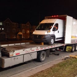Road Runner Towing - Our Flatbed Tow Truck - helping to unload a van from an 18 wheeler!