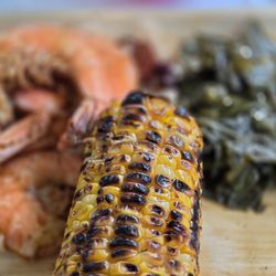 Sub Edge Farm - My 2nd plate grilled to perfection corn,  old bay jumbo shrimp and banging collards greens.