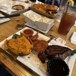 Cruisin - Sirloin and shrimp with sweet potato and Cole slaw. Way past my initial expectations.