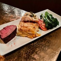 Cypress Grille - Off-menu special: 6-ounce smoked prime tenderloin, 6-ounce grilled cold water lobster tail, potatoes au gratin, broccolini