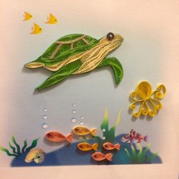 Beautiful card from The Steamer Trunk at Catalina Island. Artisans from Vietnam made this by quilling (rolling small strips of paper). Beautiful card from The Steamer Trunk at Catalina Island. Artisans from Vietnam made this by quilling (rolling small strips of paper).
