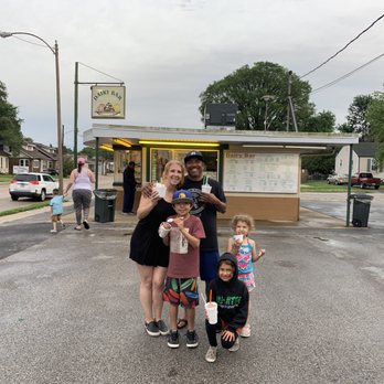 Lisa’s Dairy Bar - a family standing in front of a dairy bar - Ice Cream & Frozen Yogurt Near Me - Granite City, Illinois Lisa’s Dairy Bar - a family standing in front of a dairy bar - Ice Cream & Frozen Yogurt Near Me - Granite City, Illinois