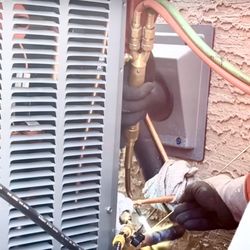Metro Cooling & Heating Pros - Installation in progress.