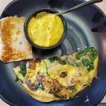 Arize Breakfast Cafe - Jamaican omelet and curry grits - Breakfast & Brunch Near Me - Atlanta, Georgia Arize Breakfast Cafe - Jamaican omelet and curry grits - Breakfast & Brunch Near Me - Atlanta, Georgia