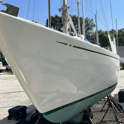 Potomac Boatcraft - Hull resurfaced, painted and striped