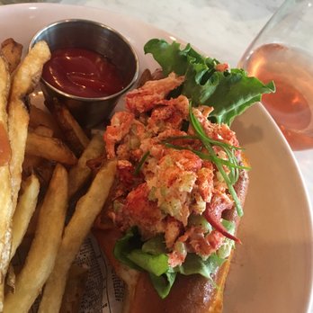 Garbo’s - Maine Lobster Roll with fries and a glass of rose - Seafood Near Me - Austin, Texas Garbo’s - Maine Lobster Roll with fries and a glass of rose - Seafood Near Me - Austin, Texas