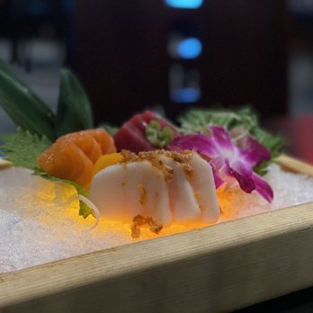 Ebisu Japanese Restaurant - Sashimi Deluxe with crispy chili oil. - Sushi Bars Near Me - Austin, Texas