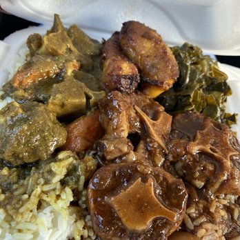 Golden Krust Caribbean - half curry oxtails with white rice/ half regular oxtails with rice& peas - Caribbean Near Me - Fairburn, Georgia Golden Krust Caribbean - half curry oxtails with white rice/ half regular oxtails with rice& peas - Caribbean Near Me - Fairburn, Georgia