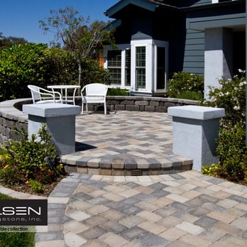 Olsen Pavingstone - Country Cobble, one of our tumbled options shown here in Granite, gives this home a rustic cottage feel. - Building Supplies Near Me - San Juan Capistrano, California Olsen Pavingstone - Country Cobble, one of our tumbled options shown here in Granite, gives this home a rustic cottage feel. - Building Supplies Near Me - San Juan Capistrano, California
