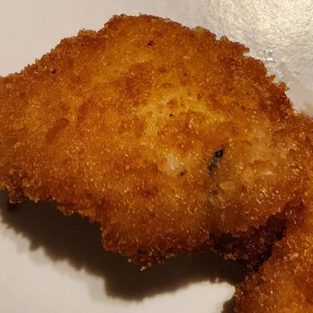 Moonlight Cuisine - a piece of fried chicken on a plate - Caribbean Near Me - Philadelphia, Pennsylvania Moonlight Cuisine - a piece of fried chicken on a plate - Caribbean Near Me - Philadelphia, Pennsylvania