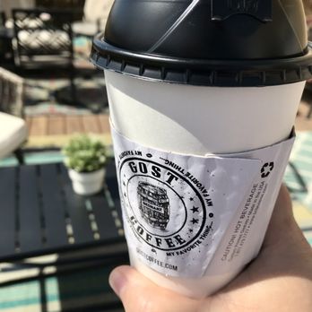 Gost Coffee Roasters - a hand holding a coffee cup - Coffee Roasteries Near Me - New Lenox, Illinois Gost Coffee Roasters - a hand holding a coffee cup - Coffee Roasteries Near Me - New Lenox, Illinois