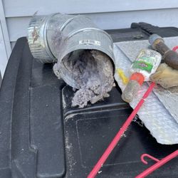 Certified Green Team - Part of dryer vent filled with lint