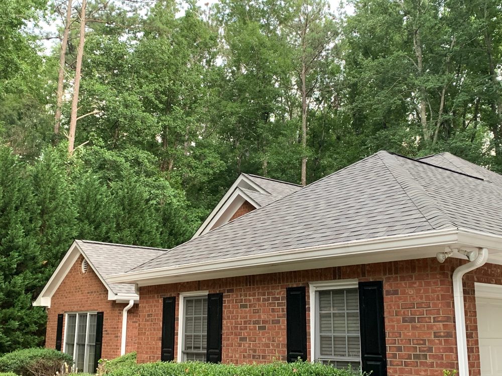 Slide of K and R Roofing