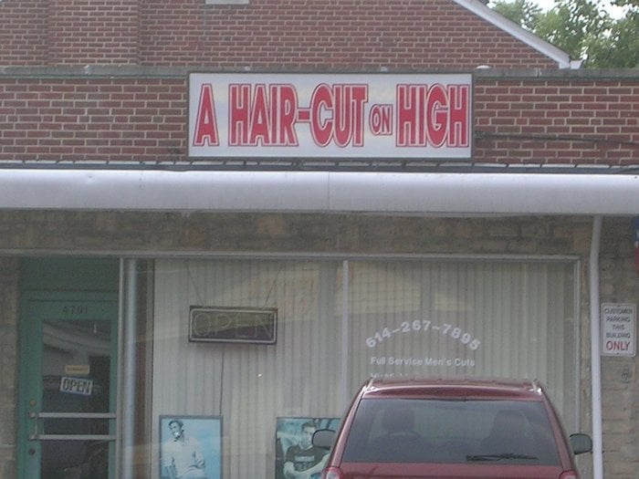 A Hair Cut On High Logo