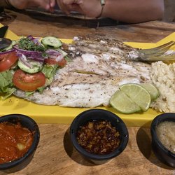 Raices Beach Club & Marina - Whole baked fish tacos, side salad and rice