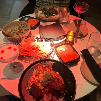Palenque Kitchen - Carnitas(foreground) and veggie enchiladas(background) - Cocktail Bars Near Me - Costa Mesa, California Palenque Kitchen - Carnitas(foreground) and veggie enchiladas(background) - Cocktail Bars Near Me - Costa Mesa, California