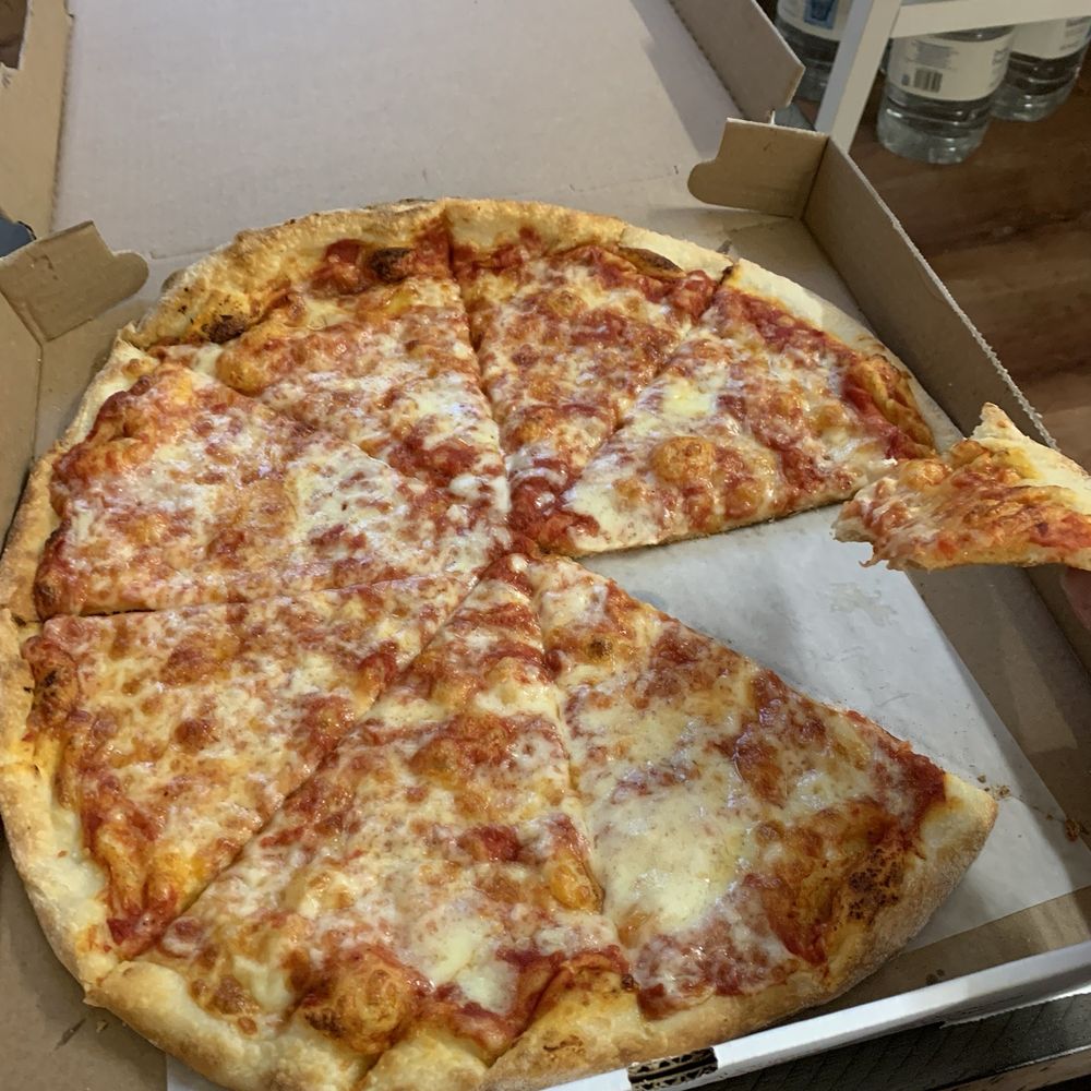 Plain pizza pie. Buy ten, get one free (pick-up only) lol Plain pizza pie. Buy ten, get one free (pick-up only) lol